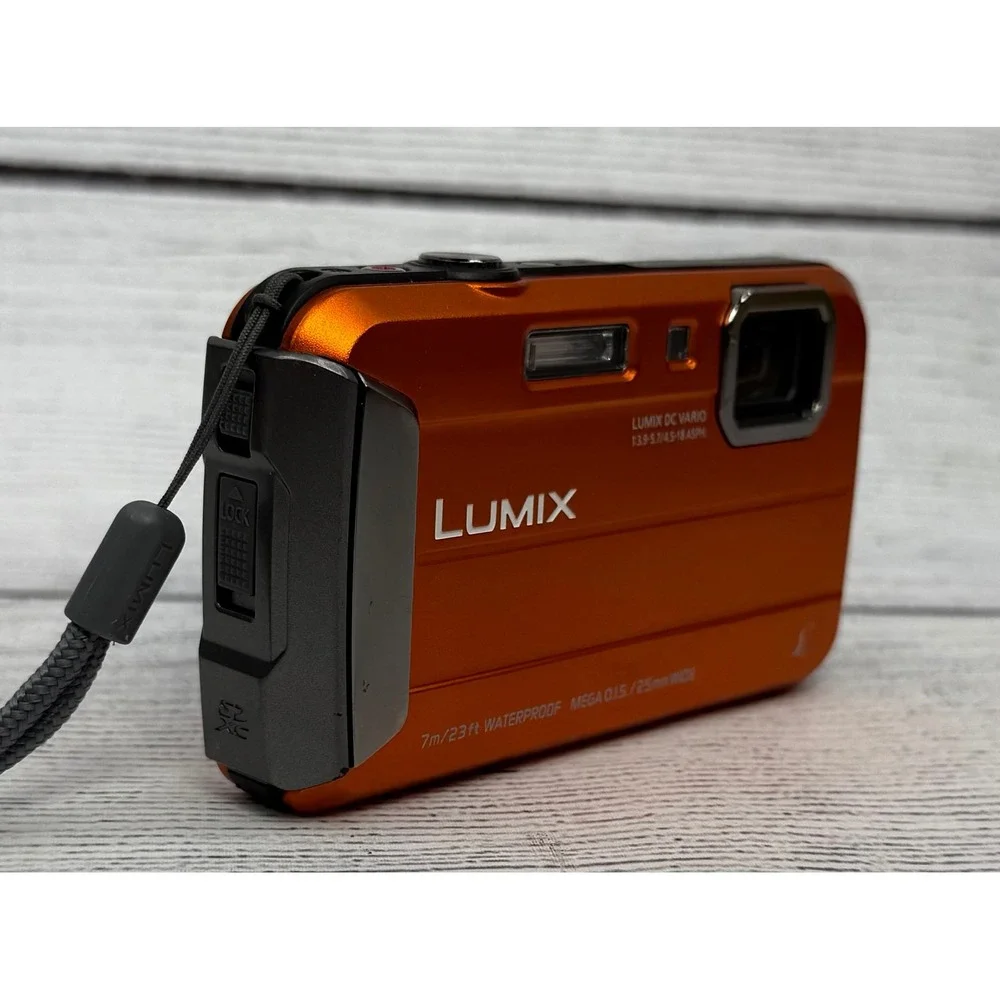 Panasonic Lumix DMC TS25 Orange Waterproof 16.1 MP Digital‎ Camera 64GB SD Card